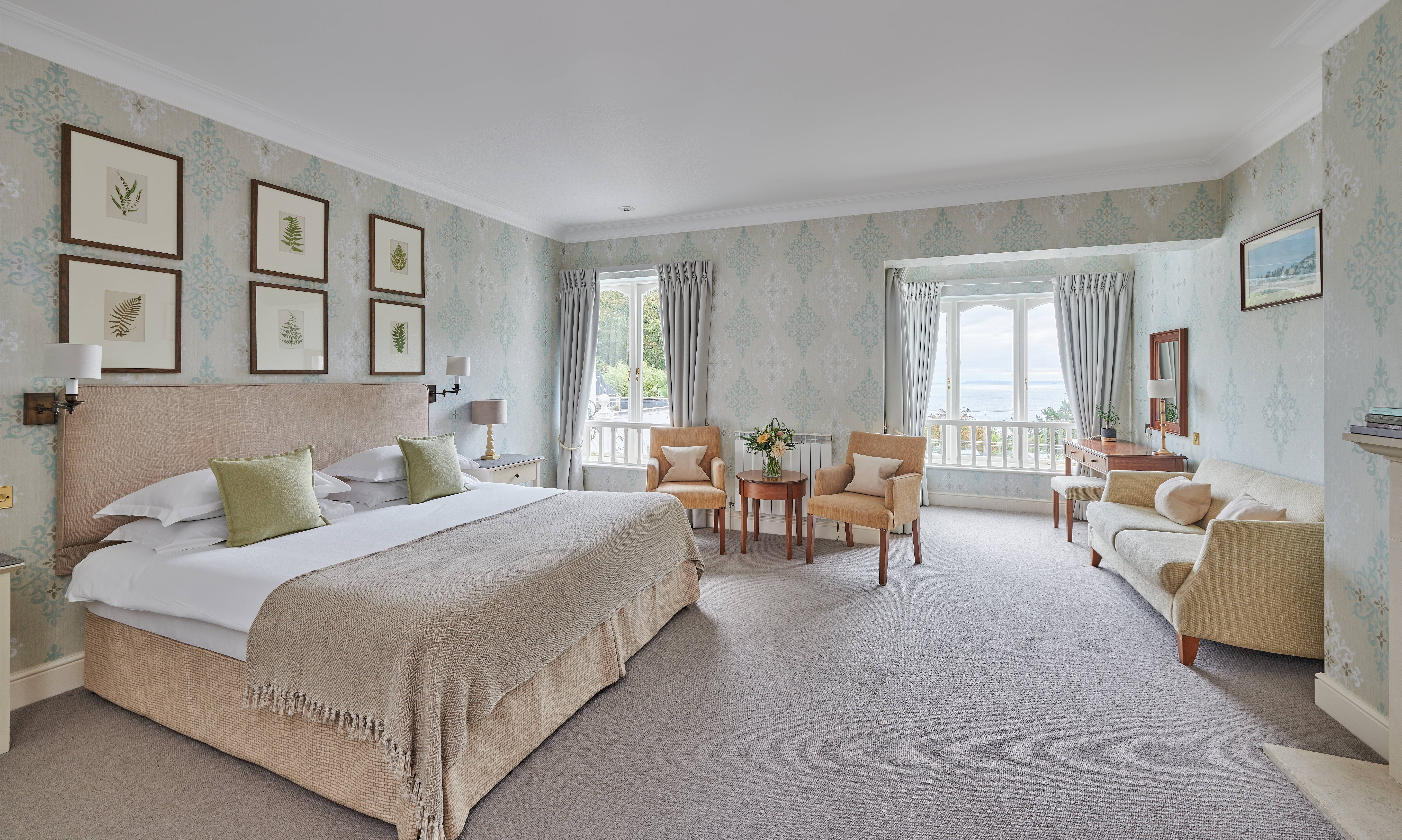 Room in side Fermain Valley Hotel that has a bed and dresser