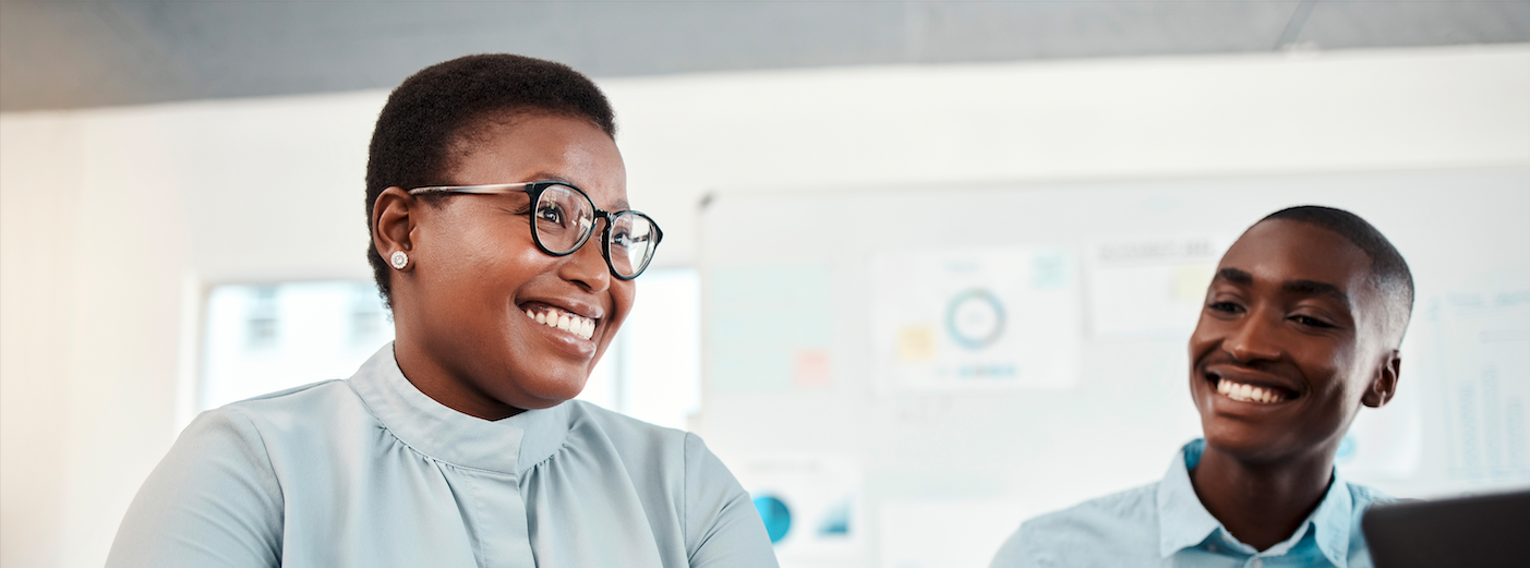 Two interns smiling